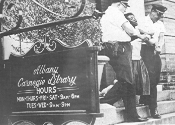 Student arrested for trying to read a book in a "white only" library in Albany, Georgia, 1963.
