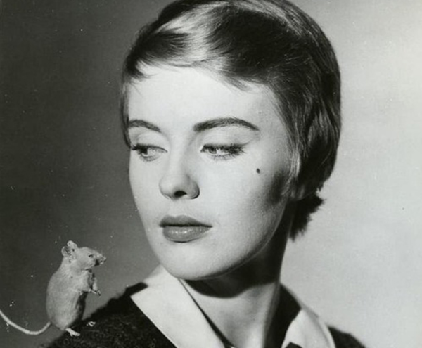 Hideous short-haired monster JEan Seberg poses with adorable mouse.